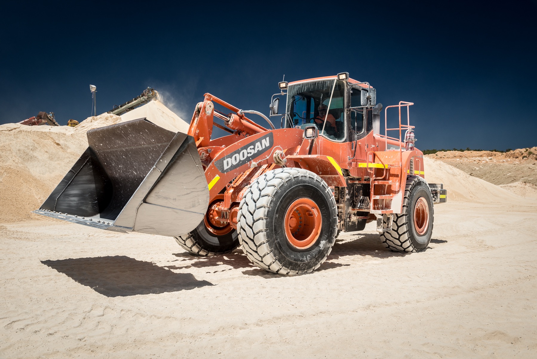 Civex wheel loader at a sandy worksite