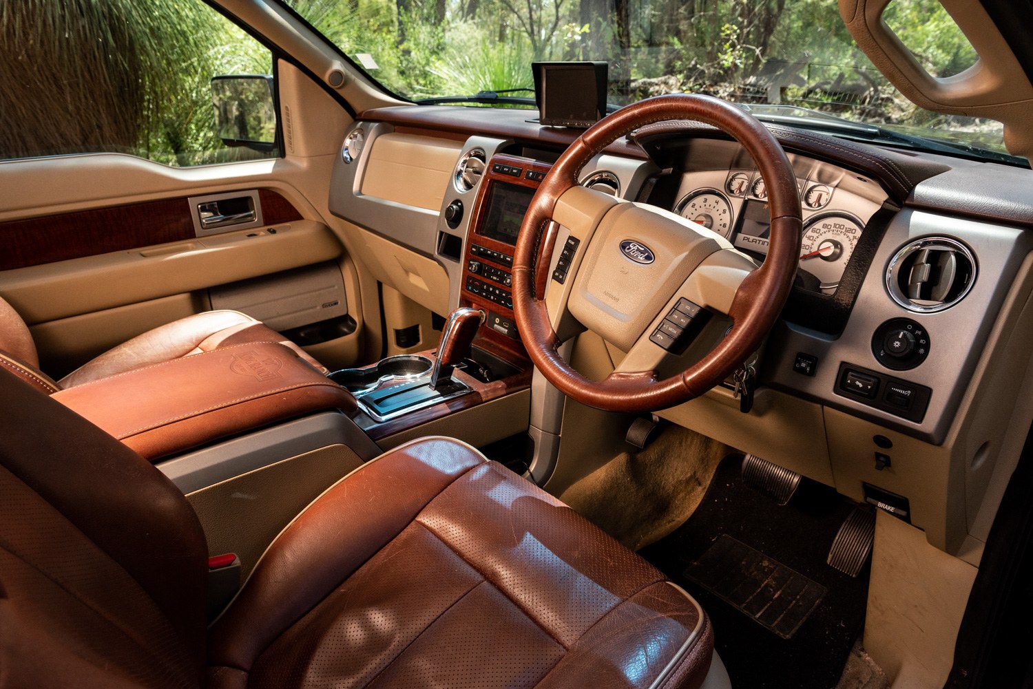 Ford F150 cabin showing leather seats and dashboard