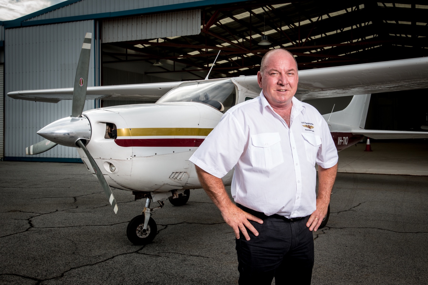 Business portrait beside an aircraft at Jandakot