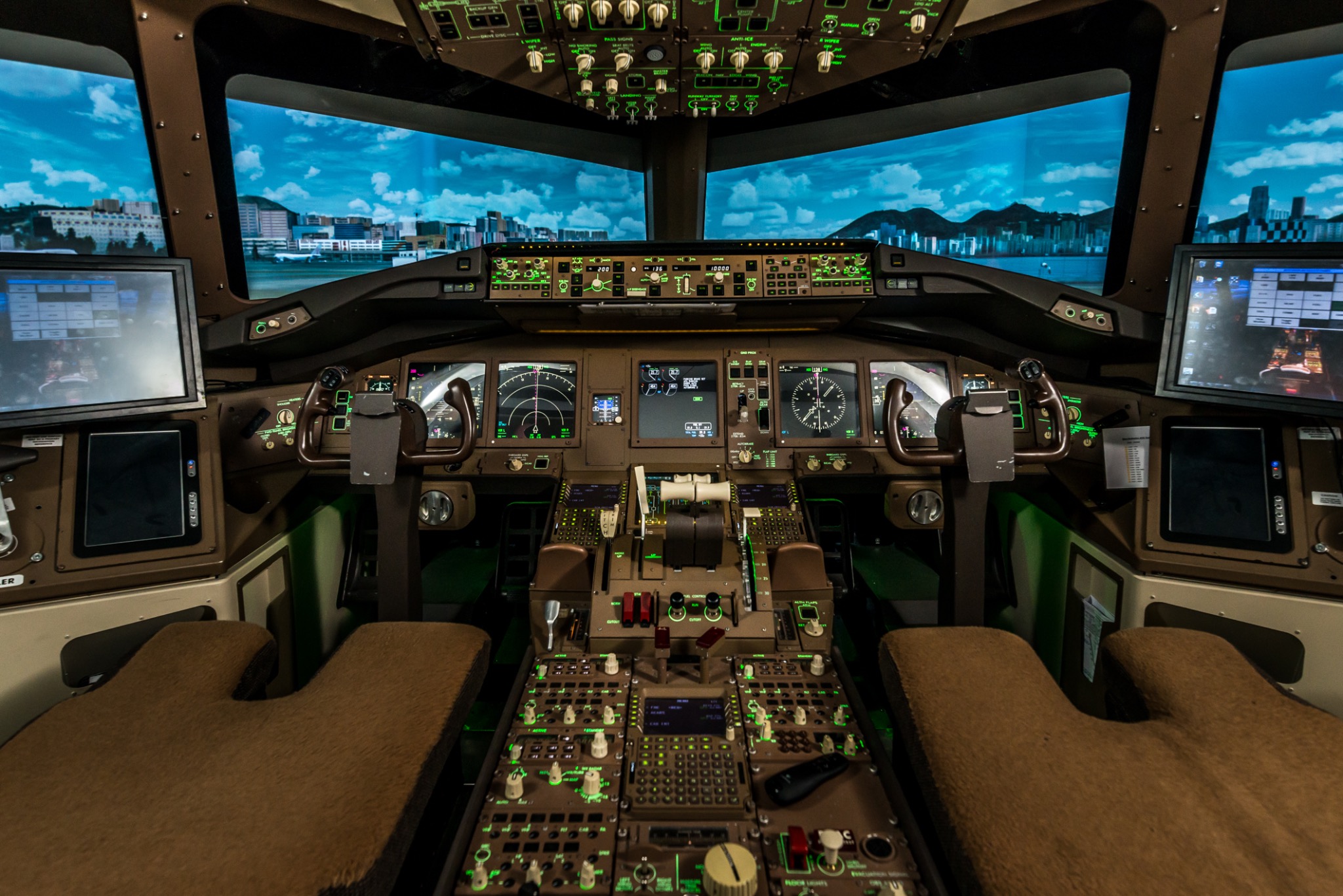 Flight simulator cockpit and illuminated instrument panels