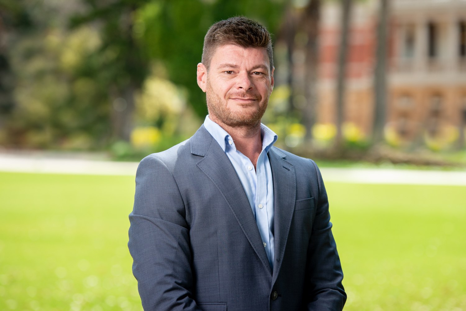 Business portrait in a suit in an outdoor setting