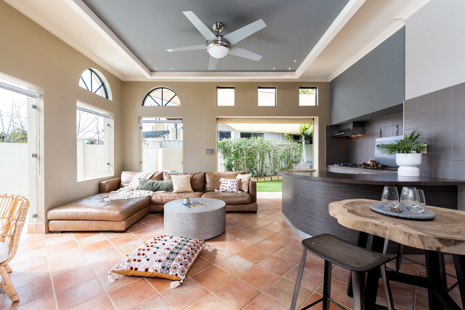 Sunlit living and dining space with high ceilings in Attadale